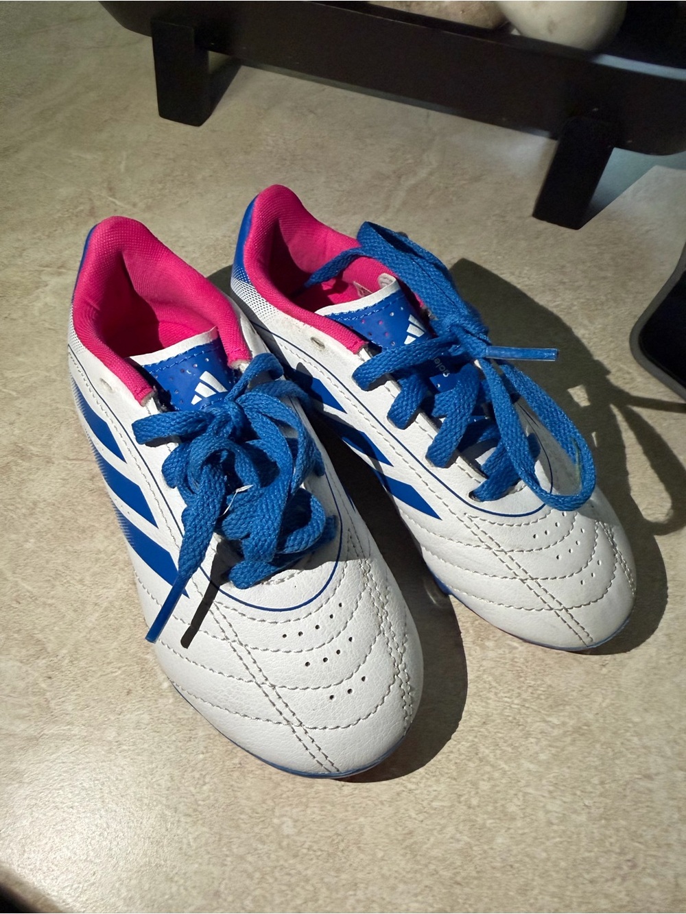 Kids Adidas White Athletic Soccer Cleats with Blue Accents and Pink Lining
